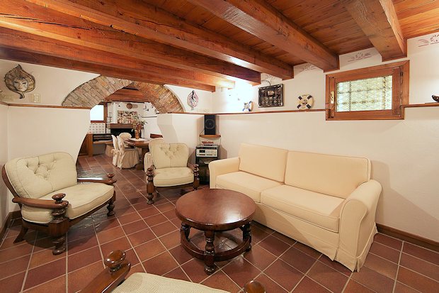 Wohnzimmer der Eigentumswohnung in San Polo