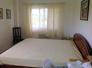 Schlafzimmer vom Haus am Meer auf Sandingan