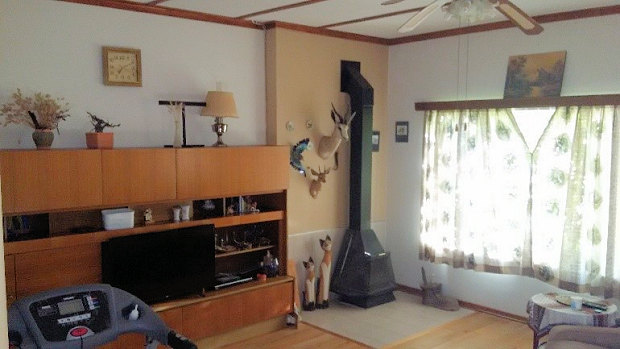 Wohnzimmer vom Ferienhaus mit Kaminofen
