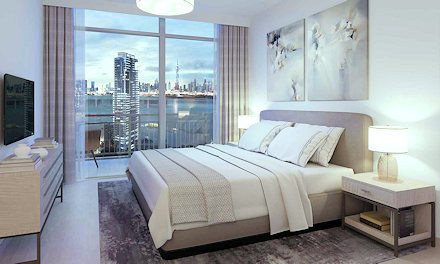 Schlafzimmer eines Apartments im Waves Opulence in Dubai