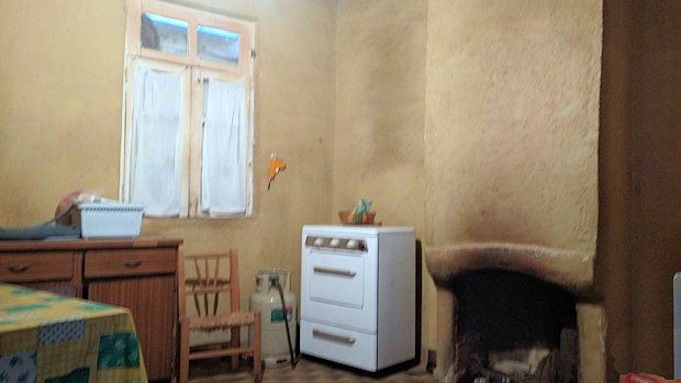 Kche mit Kamin im Ausbauhaus