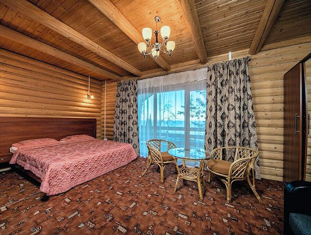 Zimmer eines Ferienhauses im Ferienresort