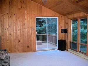 Wohnzimmer mit Terrasse im Einfamilienhaus Wohnzimmer mit Terrasse im Einfamilienhaus