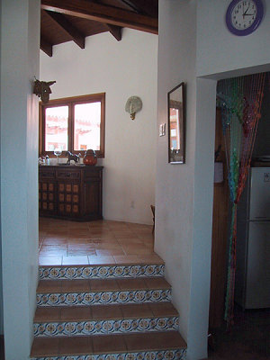 zu den Zimmern der Villa